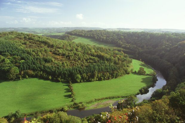 Rural landscape with fields, woodland and river